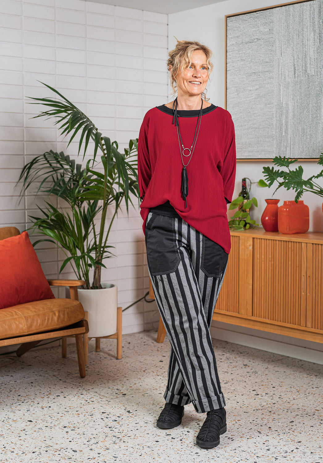 Designer pants with stripe online